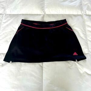Adidas black with pink trim, Supernova Athletic skorts.